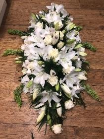 Lily and rose casket spray