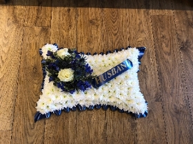 Pillow with sash