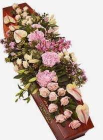 Pink rose and anthurium casket spray