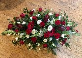 Red and white casket spray