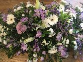 Lilac and white casket spray