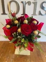 6 rose and Ferrero rocher hand tied